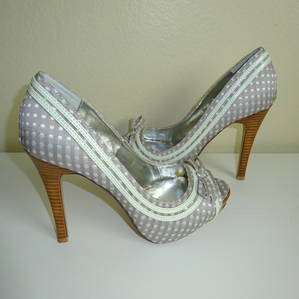 Polka dot pink heels by brand: not rated